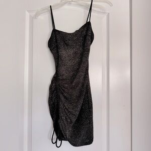 Shimmery spaghetti strap dress.